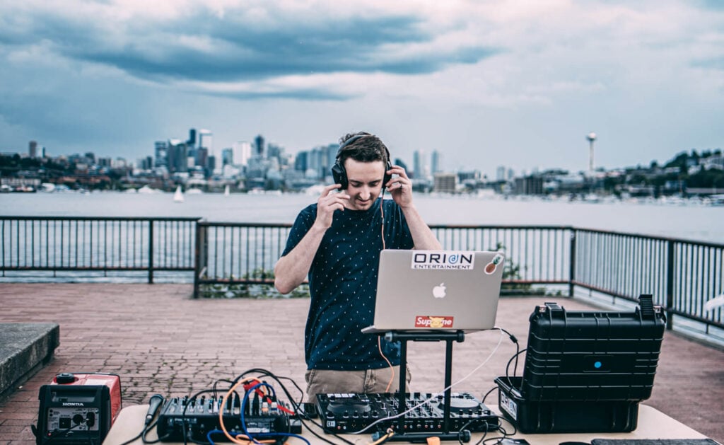 Image of a wedding DJ playing at a local wedding venue.