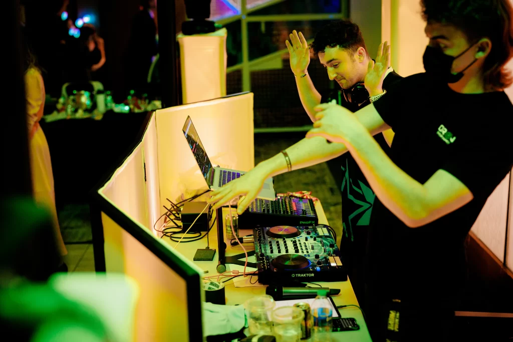 Image of a DJ handling song requests during a wedding event, tailored to the guests' specific music collection.