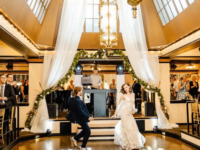 Image of a Seattle wedding DJ leading the dance party portion of the night.