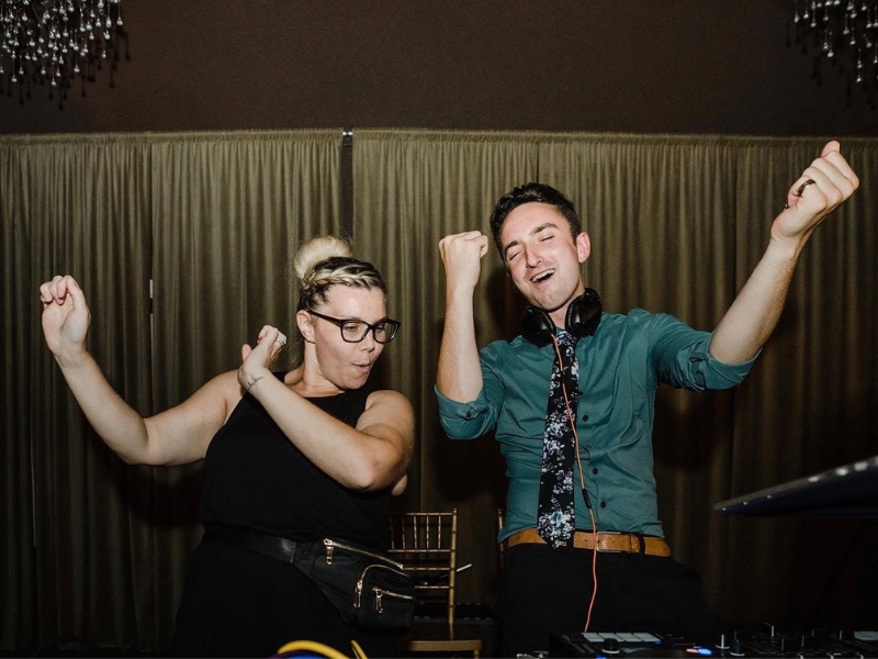 Image of a wedding DJ having fun at the reception.