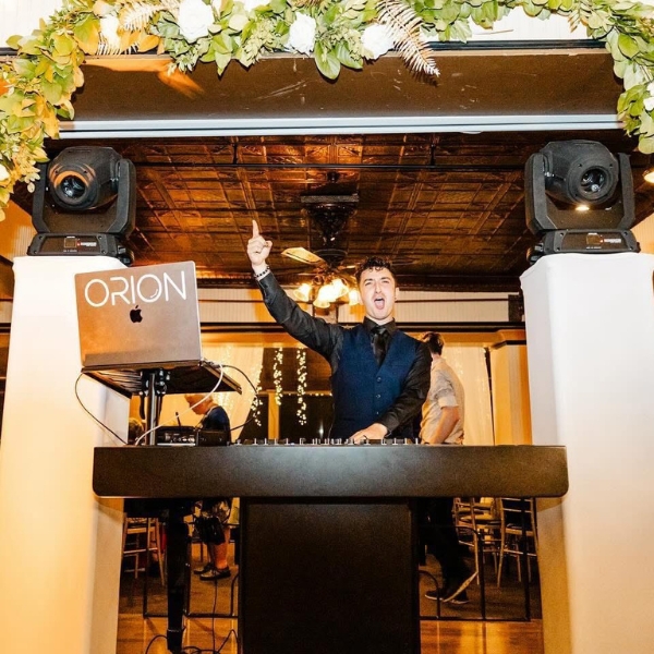 Image of a wedding DJ in Seattle (Orion Entertainment), providing a personalized experience at a wedding and making it a truly special occasion.